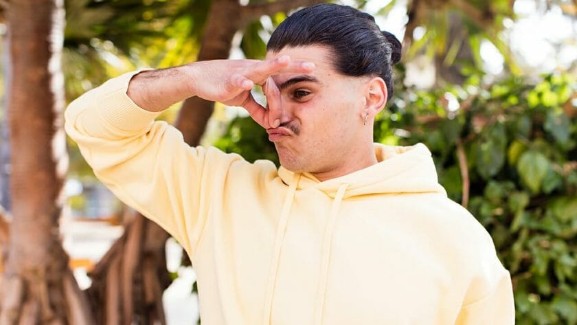 man pinching nose ss2272744959